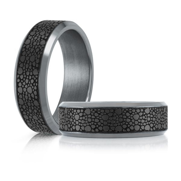 Tantalum band with black carved design.