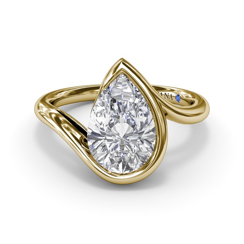 Pear-shaped diamond, twisted yellow gold band.