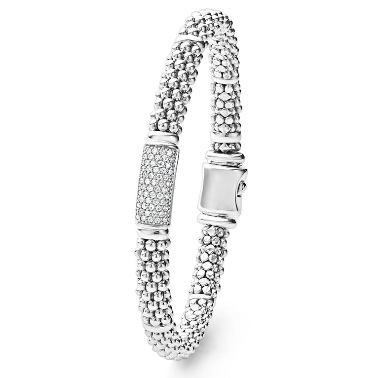 Sterling silver bracelet with diamond accents.