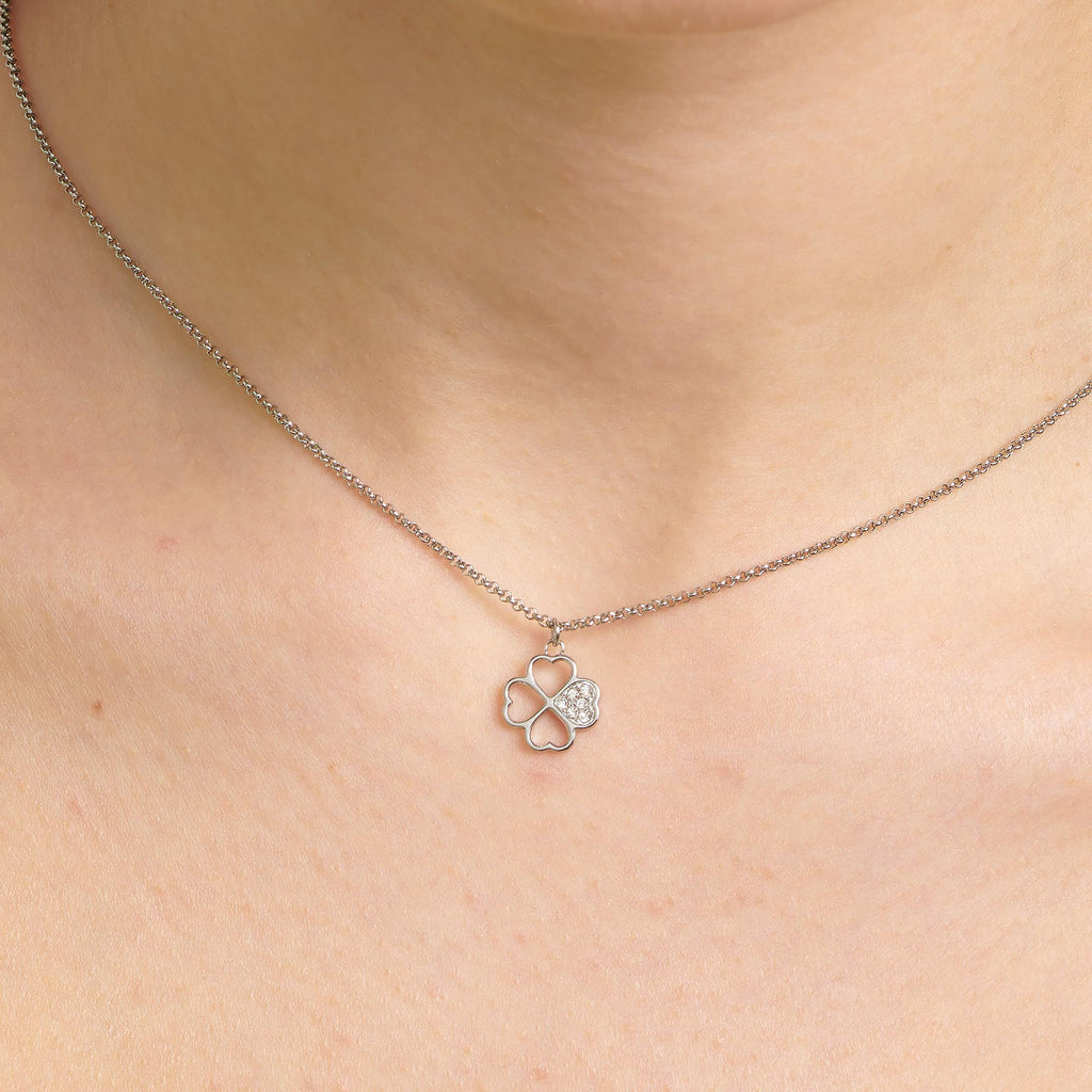 Clover pendant with simulated diamond accents.