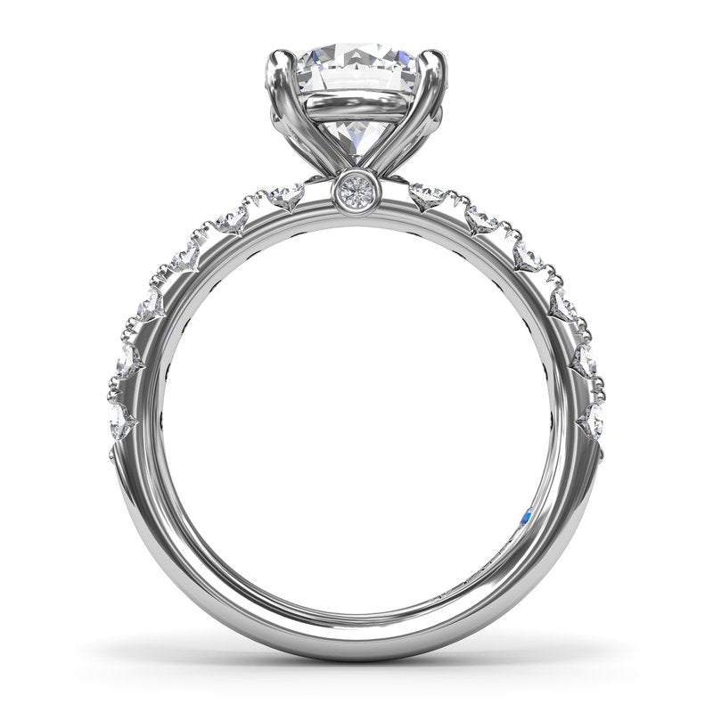 14K white gold ring with emerald diamonds.