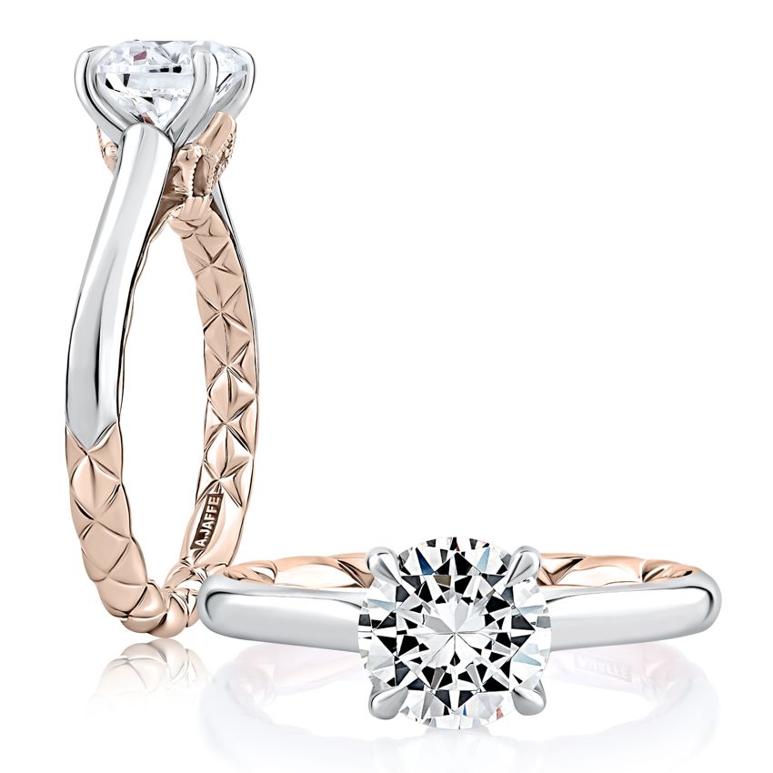 White rose gold ring with round diamond.