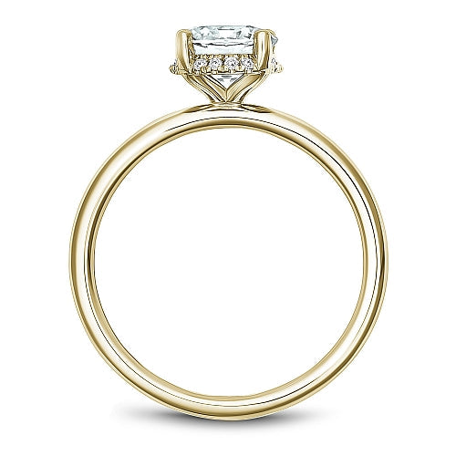 Yellow gold ring with diamond accents.