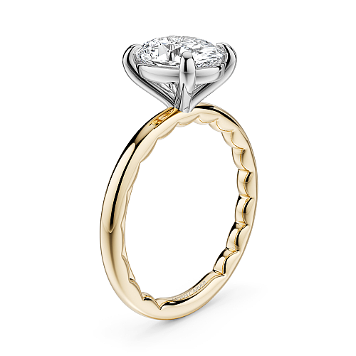Dual-tone gold ring with diamond accents.