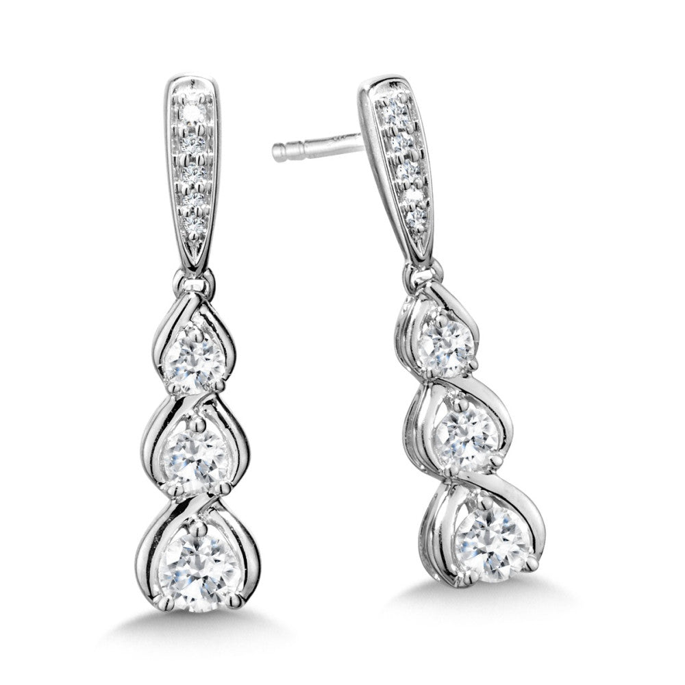 Diamond drop earrings in white gold.