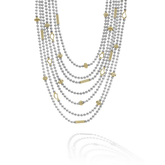 Sterling silver layered necklace with gold accents.