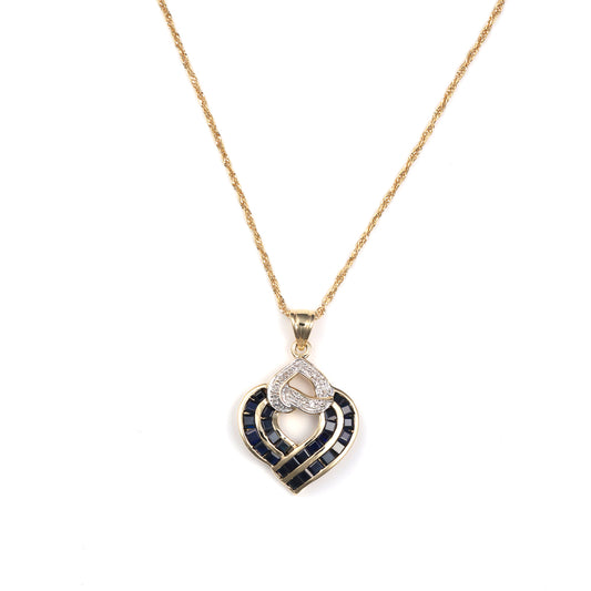 Heart-shaped necklace with sapphires and diamonds.
