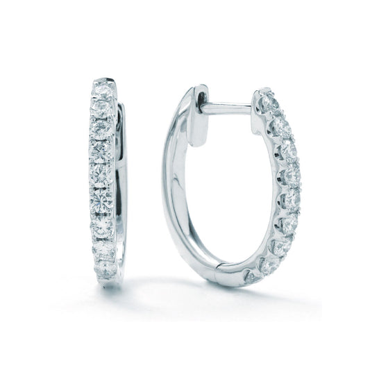 14K white gold diamond hoop earrings.