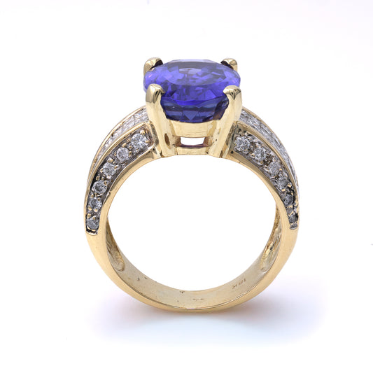 ReMARKable Estate Color Gemstone Ring in 18 Karat Yellow Gold with 1 Oval Bluish Violet Tanzanite 7.00ctw 15.5mm-15.5mm