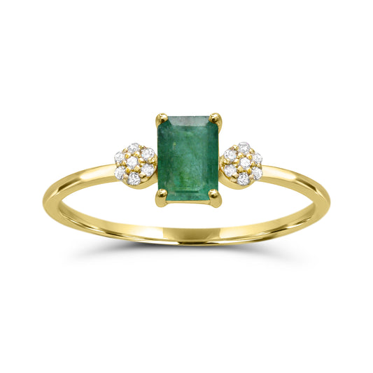 Emerald ring with diamond accents in gold.