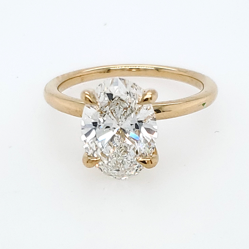 Lab-Grown Complete Diamond Engagement Ring in 14 Karat Yellow with 3.05ctw E VS1 Oval Lab Grown Diamond