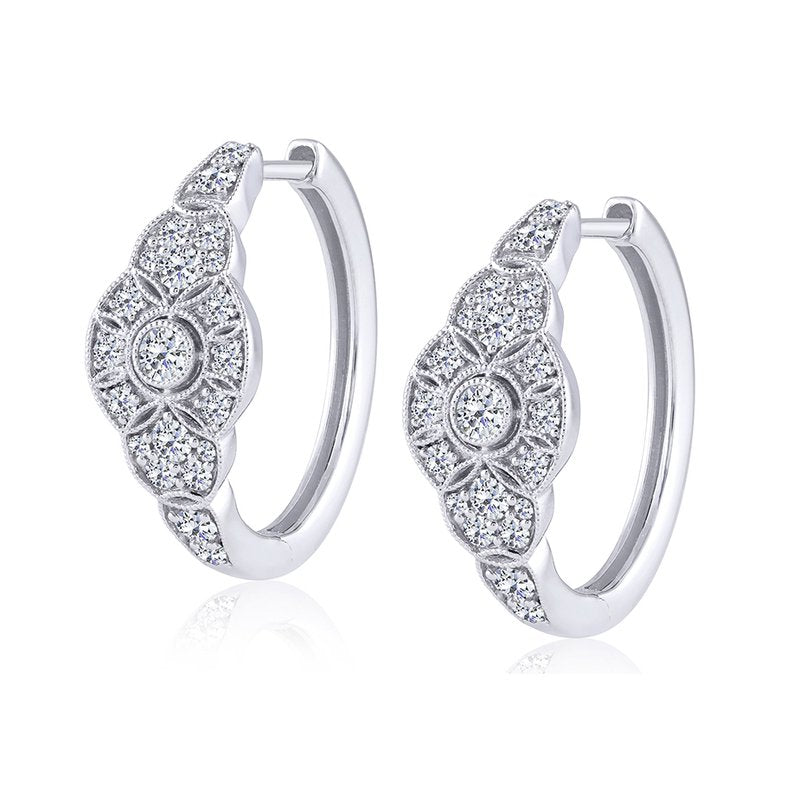 14K white gold diamond hoop earrings.
