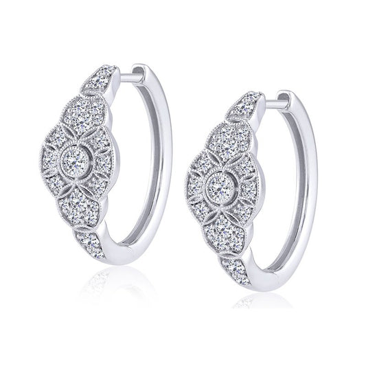 14K white gold diamond hoop earrings.
