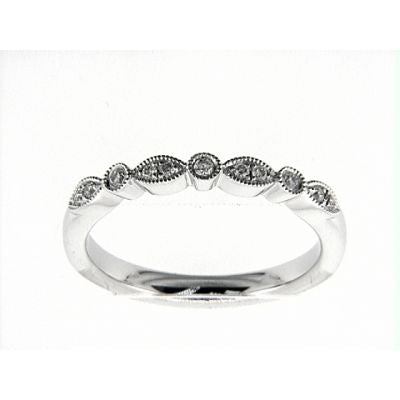 14K white gold band with round diamonds.