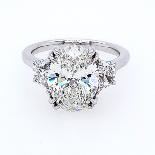 Three Stone Lab-Grown Diamond Complete Engagement Ring in 14 Karat White with 4.11ctw G VVS2 Oval Lab Grown Diamond