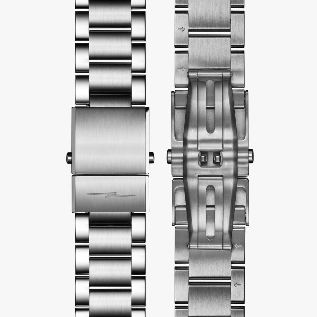 Stainless steel watch clasp and links.