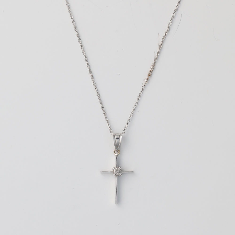 14K white gold cross necklace with diamond.