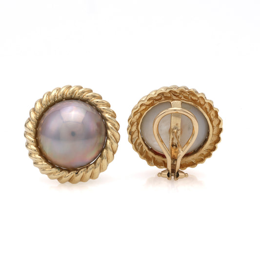 14K gold earrings with grey Mabe pearls.
