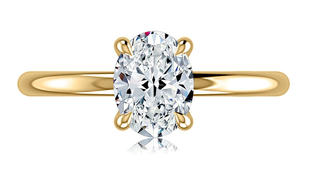 Yellow gold ring with oval diamond centerpiece.