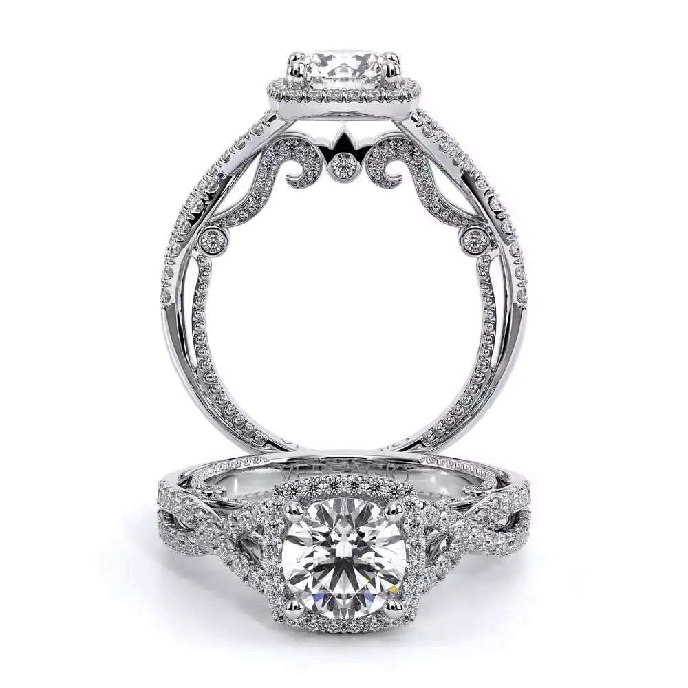 Halo diamond engagement ring with intricate detailing.