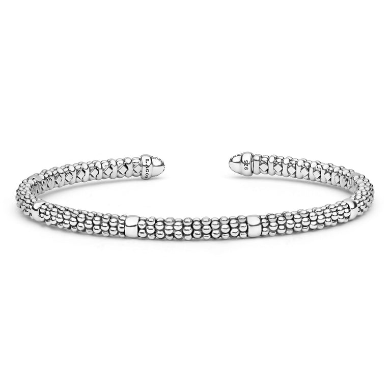 Sterling silver cuff with diamond accents.