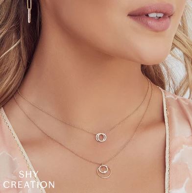 14K gold necklace with round diamonds.