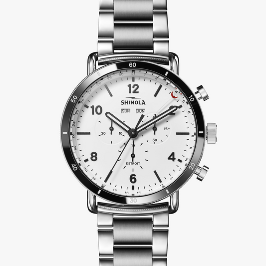 Stainless steel watch with white dial.