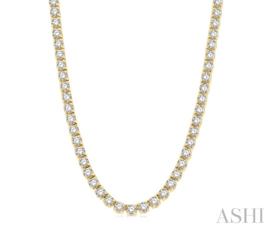 Yellow gold tennis necklace with round diamonds.