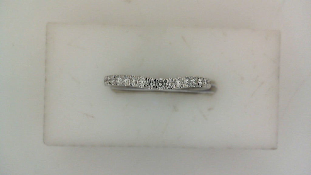 Contour wedding band with round diamonds.