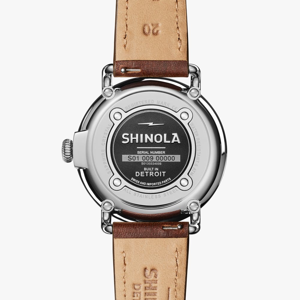 Shinola watch back with leather strap.