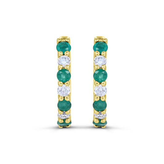 Emerald and diamond gold hoop earrings.