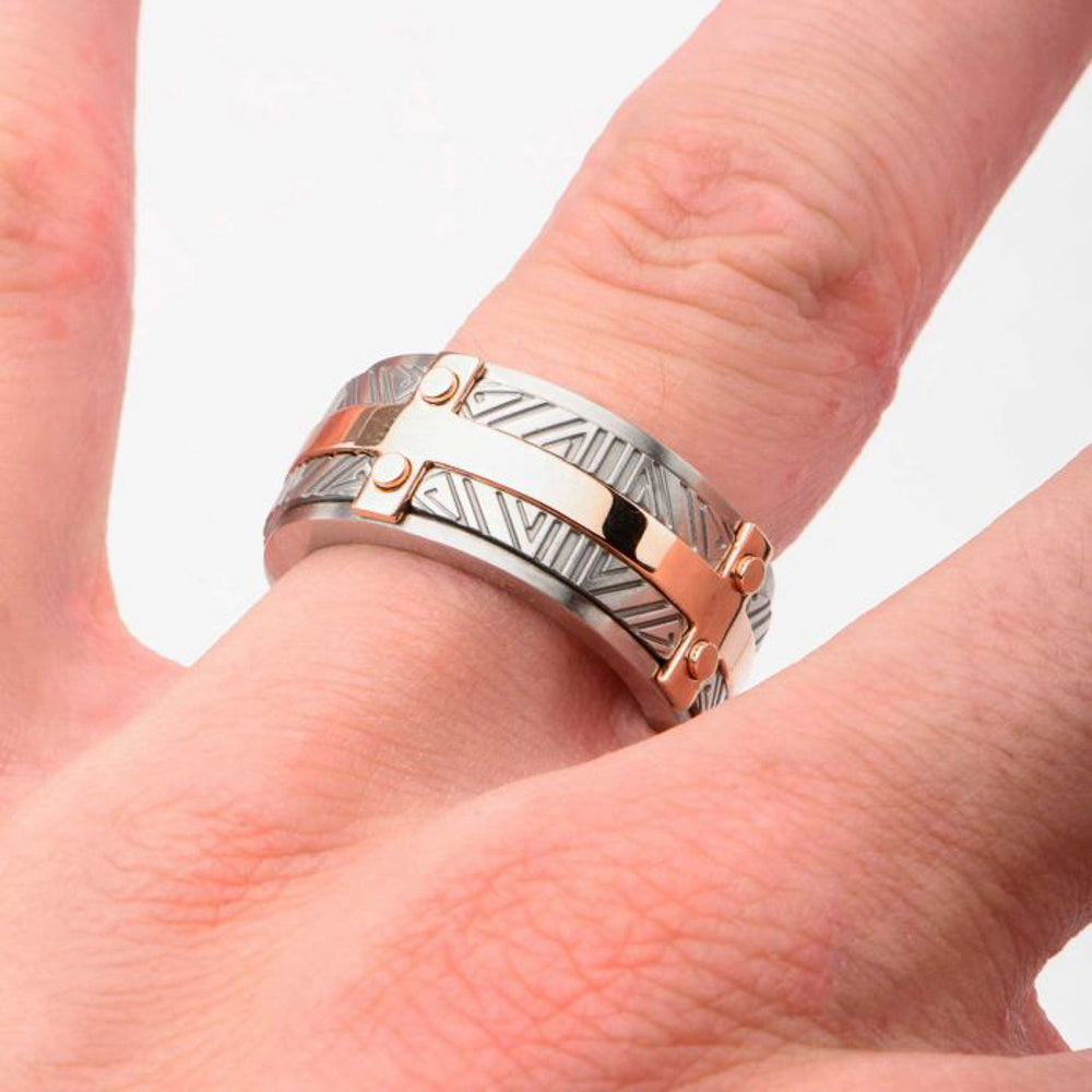 Stainless steel gold-plated ring, geometric pattern.