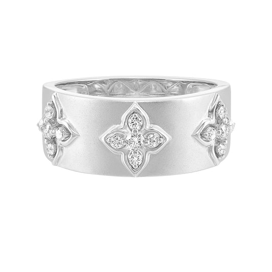 White gold ring with diamond floral motifs.