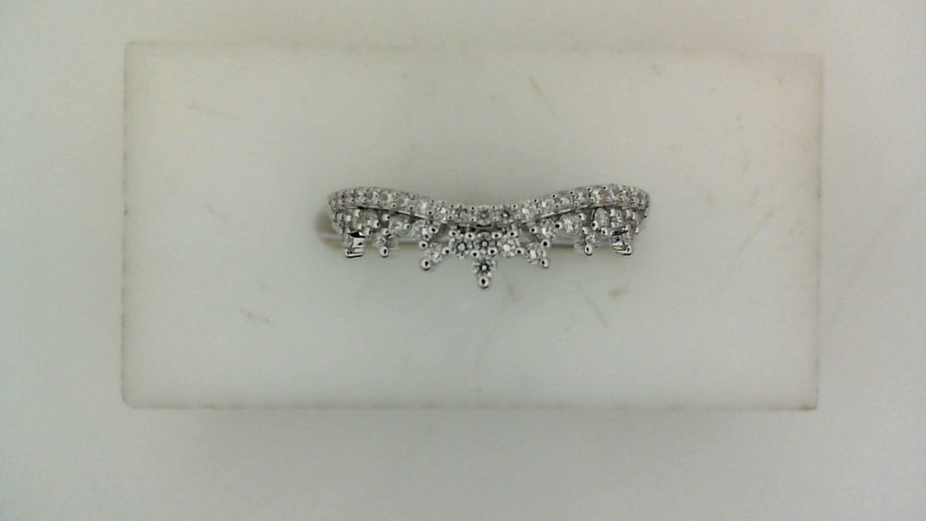 Contour wedding band with round diamonds.