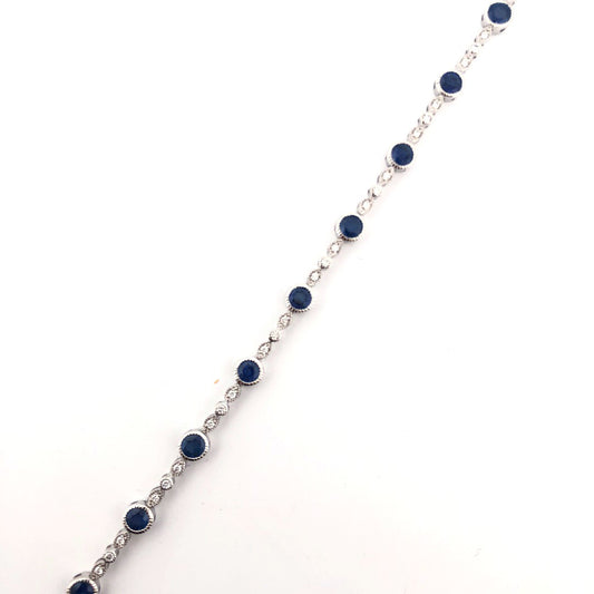 Color Gemstone Bracelet in 14 Karat White with 14 Round Sapphires 3.22ctw