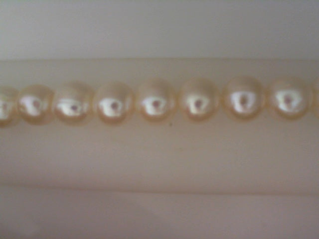 Freshwater pearl necklace with sterling silver.