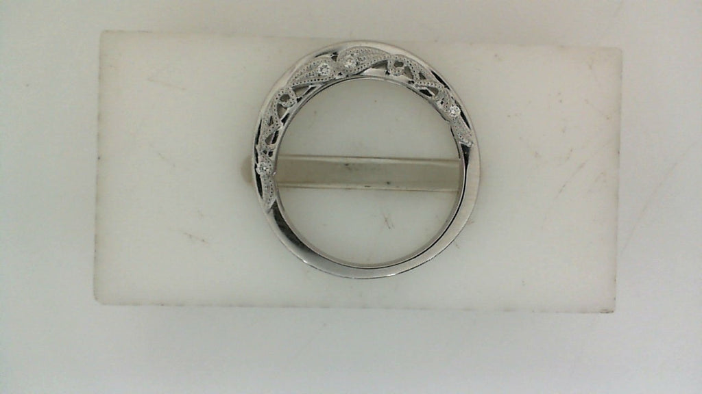 Vintage white gold band with round diamonds.