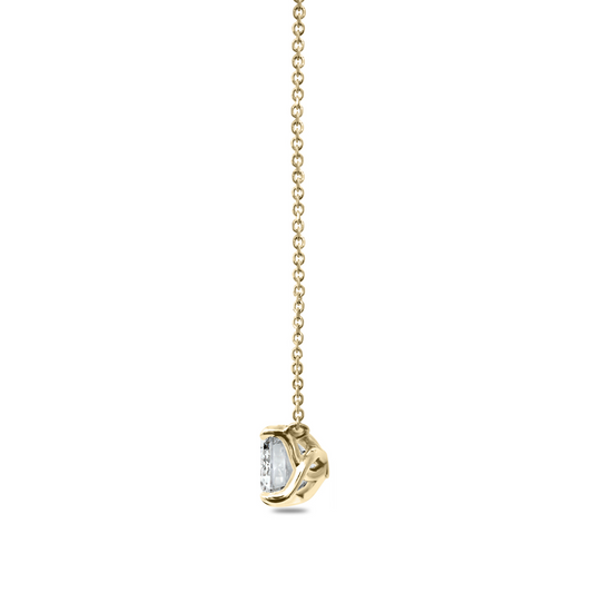 Emerald-cut diamond pendant on gold chain.