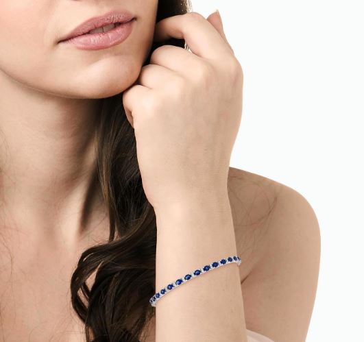 Oval sapphire and diamond station bracelet.