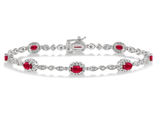 Oval ruby and diamond station bracelet.