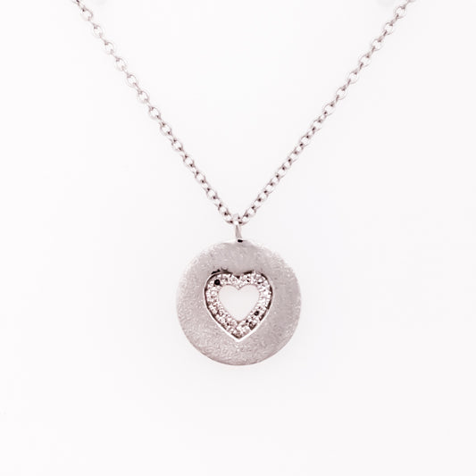 Heart-shaped diamond pendant, white gold necklace.