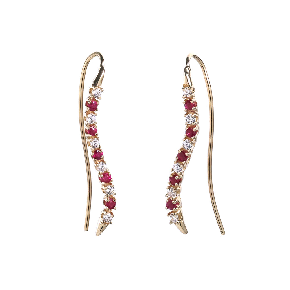 Ruby and diamond crawler earrings in gold.