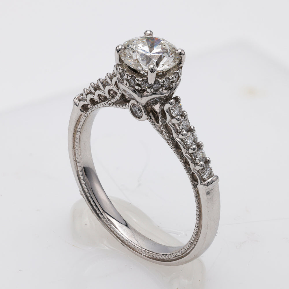 Vintage diamond engagement ring with side stones.