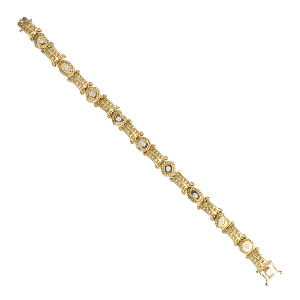 18K yellow gold bracelet with round diamonds.