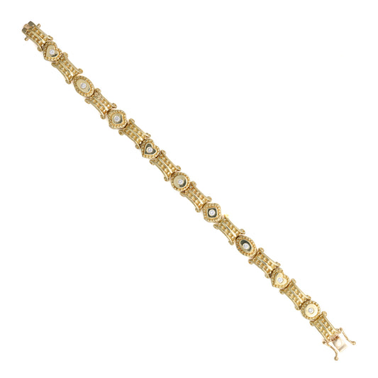 18K yellow gold bracelet with round diamonds.