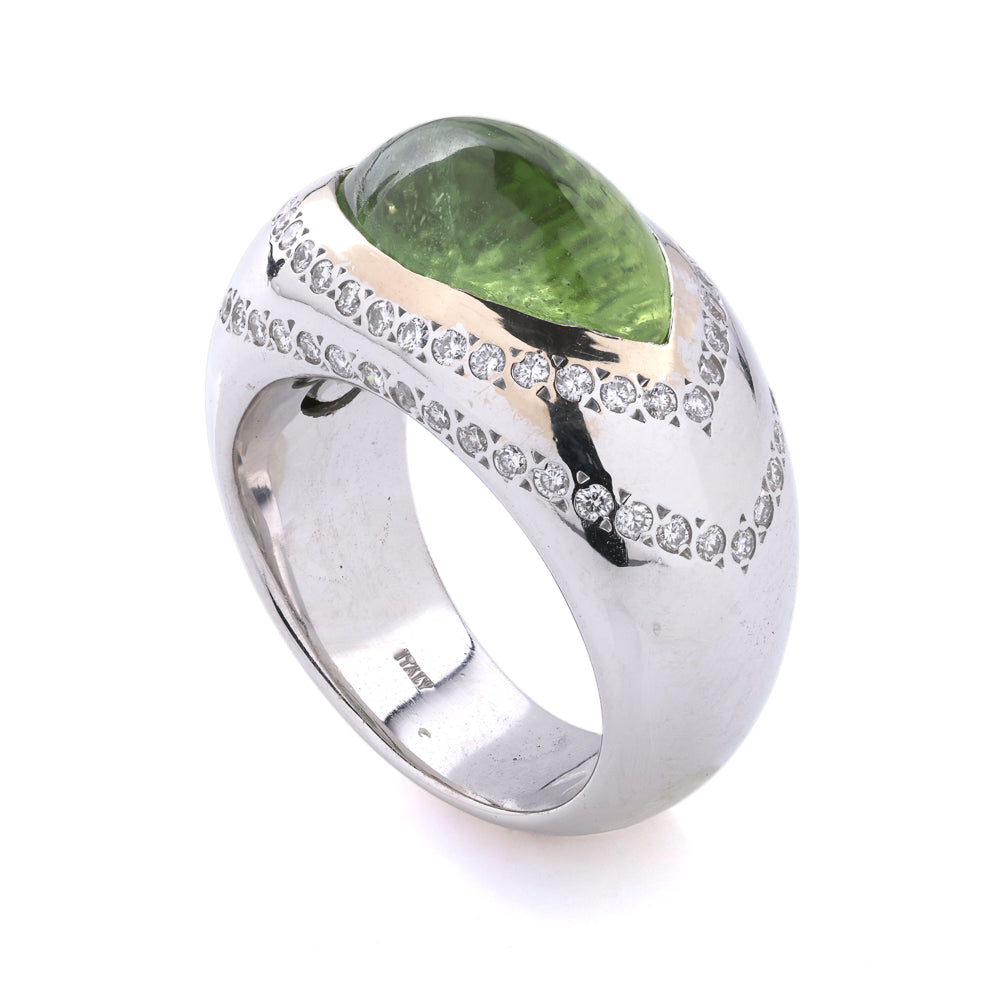 Peridot ring with diamond accents, white gold.