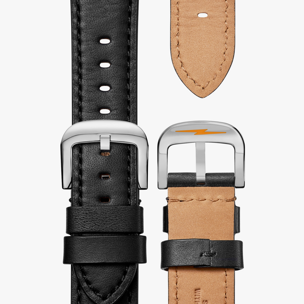 Black leather watch straps, silver buckles.