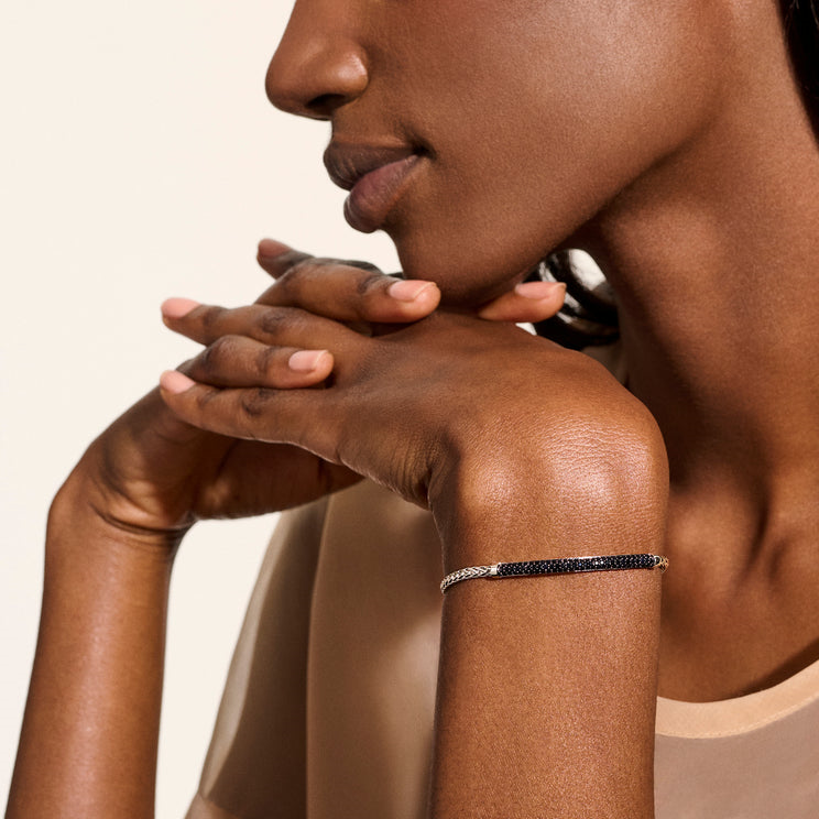 Black sapphire bracelet, sterling silver, station design.