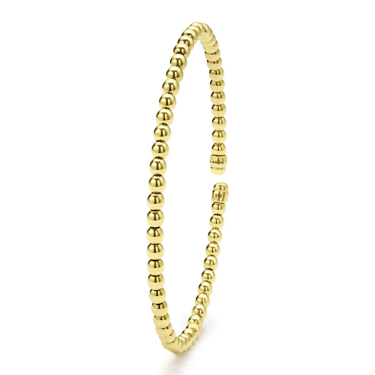 Gold beaded cuff bracelet, no stones.