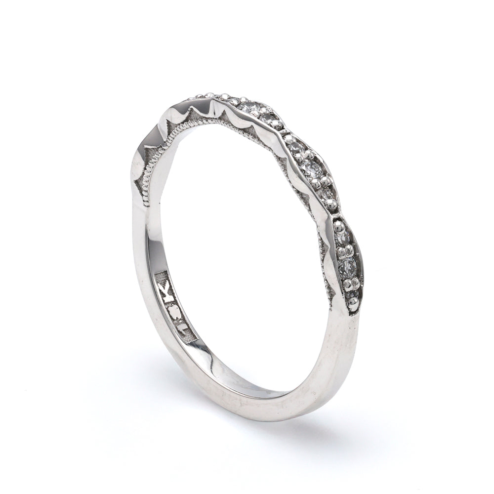 18K white gold band with diamonds.